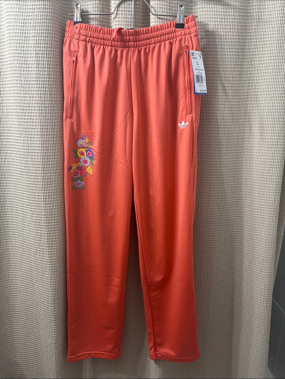 adidas Coral-Orange Track Pants with Floral Embroidery